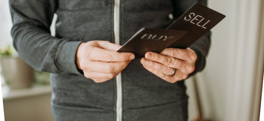 a person holding a cell phone in their hands